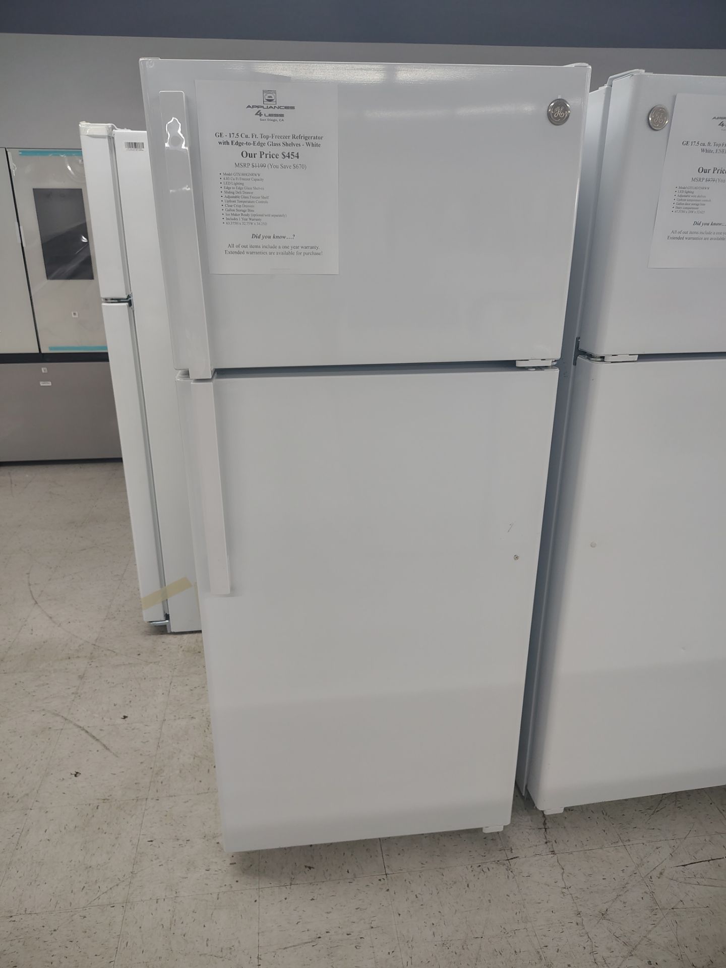 $454 GE Top Freezer Refrigerator with edge to edge shelves
