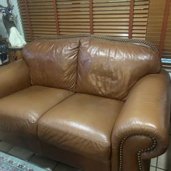 Brown Leather Love seat
