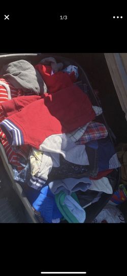 Bin of baby boy clothes