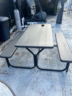 I am selling a plastic table for indoor or outdoor use, in very good condition.