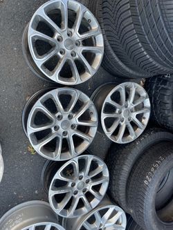 Used set of rims 18 inch OEM JEEP 5x127 250$ for 4 rims plus tax . Sold AS IS. Mount available but not included. Wheel alignment available. City ti