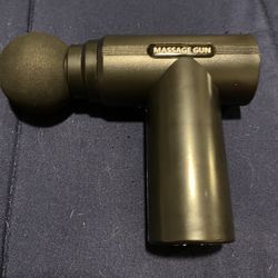 Hand held massage gun