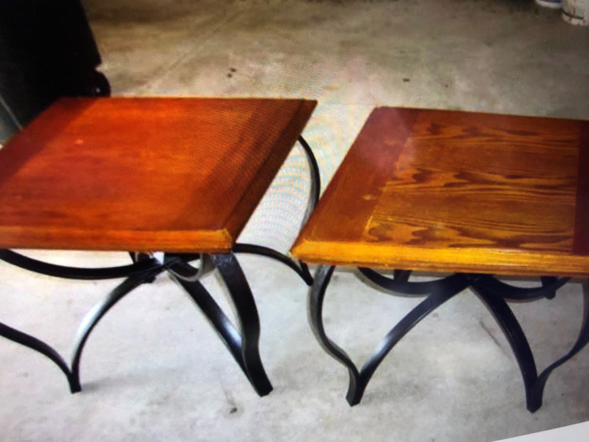 Two wrought iron legs and wood top end tables