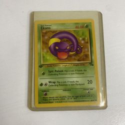 1999 Pokemon Fossil 46 Ekans 1st edition Pokemon card