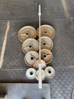 Olympic weights 235lbs total plus 7ft 40lbs bar