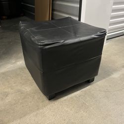 Small black ottoman 