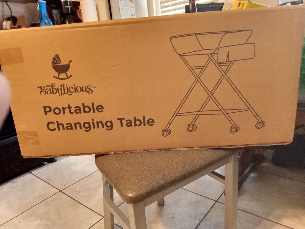 New Never Opened Portable Changing Table