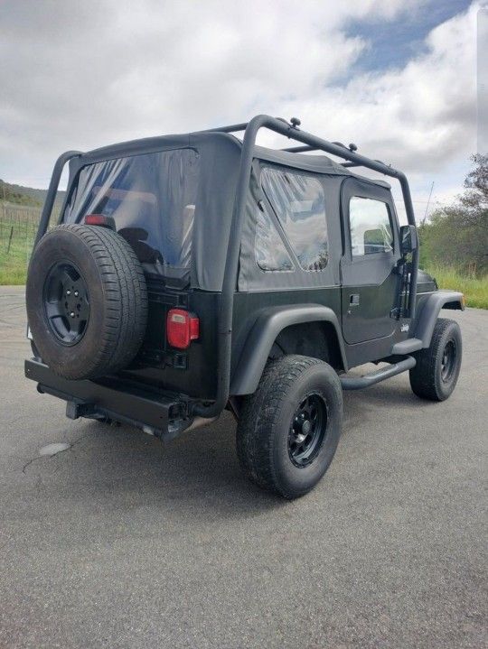 Jeep Wrangler TJ With Roof Rack Tires