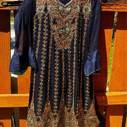 Blue dress with trousers