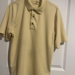 Grand Slam Size M Short Sleeve 3 Button Pullover. Short Sleeves