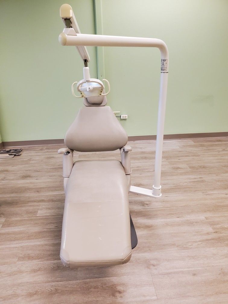  Dental Exam Chair and Light Bar. We have four for sale, you can buy one or al four.l