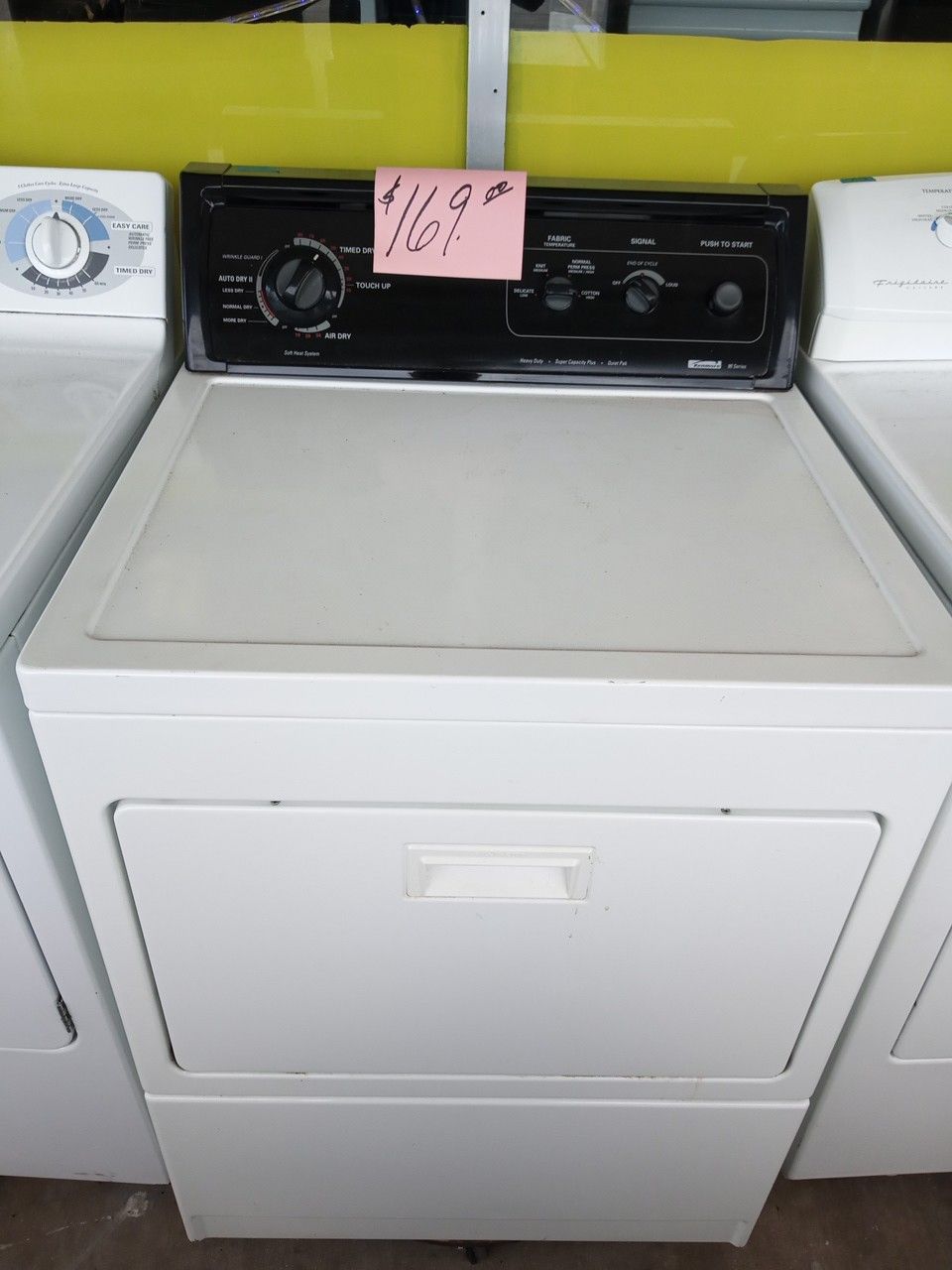 Kenmore Dryer white heavy duty super size excellent . Warranty . Delivery available . 2203 Fowler st . Ft. Myers 33901
