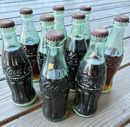 Lot of 9 Vintage 1950’s/60’s Unopened 6 1/2 oz Coke Bottles