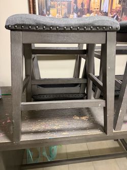 Gray Wood Bar Stool with Nailhead Upholstery
