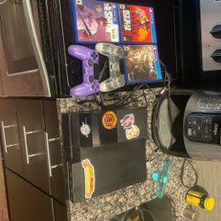 PS4 With 2 Controllers And 3 Games 