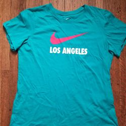 NIKE TEE YOUTH SIZE XL AND REGULAR SIZE SMALL