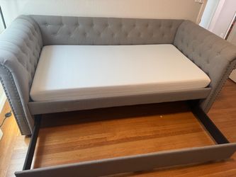 Gray upholstered day bed - frame only