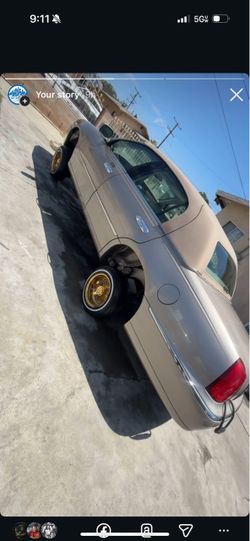 13x7 100 spokes Lincoln town car 2000