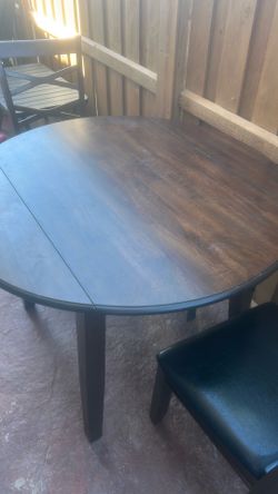 Apartment size table with two chairs leaves full down to make it even smaller