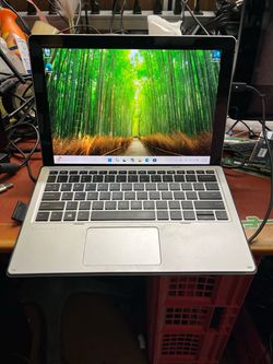 HP elite x2 1012 G2 laptop  I7-7600 @ 2.80 GHZ 8GB RAM  256GB SSD Windows 11 pro. It has a small crack in the back. See pictures for more details. Don