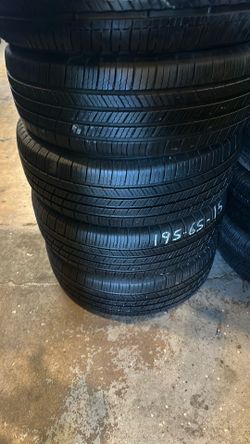 Set of 195/65R15 Michelin Defender all season tires