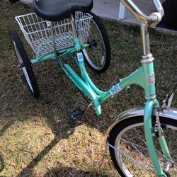 Sun, three wheel bike..