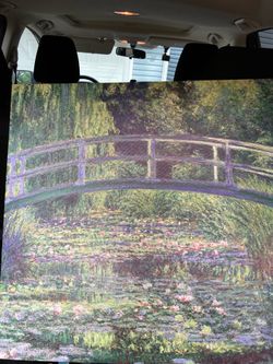 The Water Lily Pond by Claude Monet