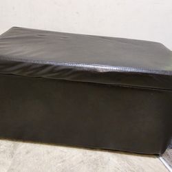 Black storage ottoman