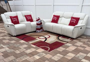 Beautiful and modern white living room set in synthetic leather (faux leather). Delivery available for an additional cost