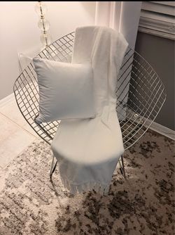 Two contemporary wire chairs