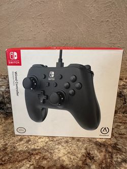 NINTENDO SWITCH WIRED CONTROLLER OPEN BOX CONDITION (15.00)