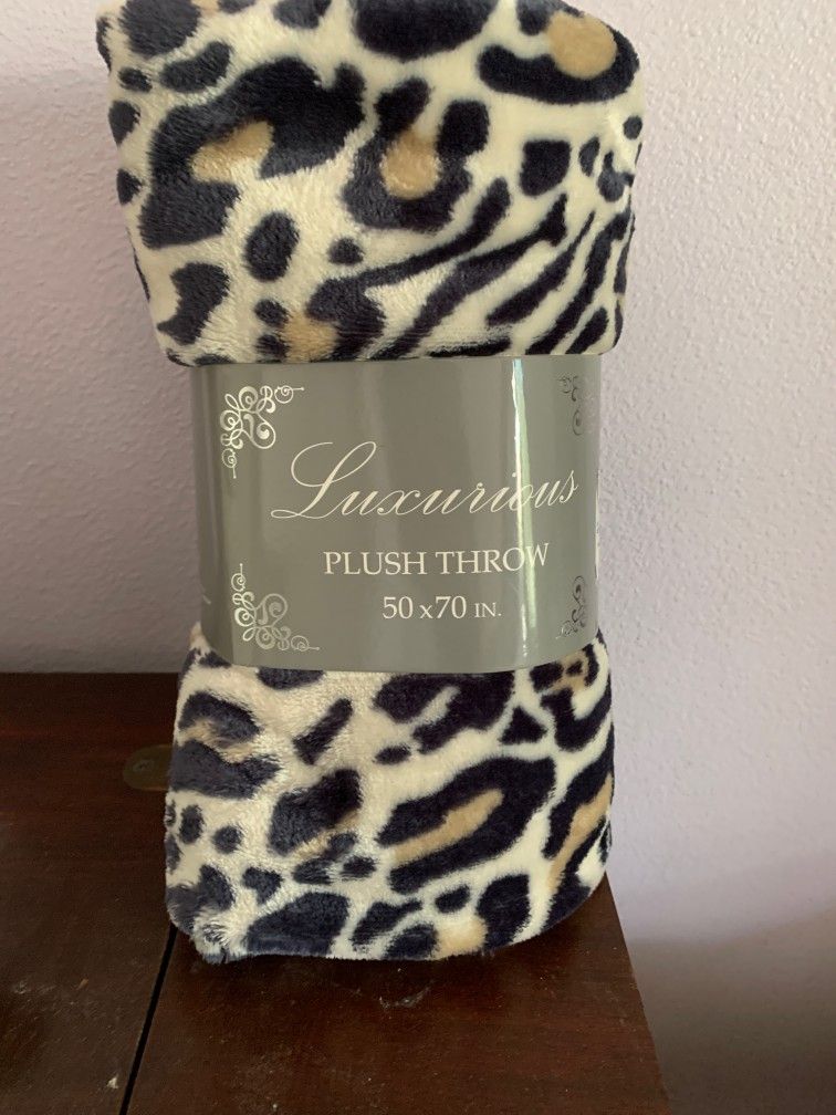 2 New Pretty Blankets $15