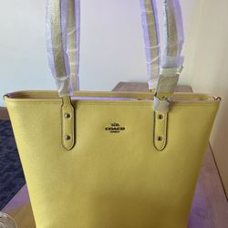 BRAND NEW YELLOW COACH PURSE
