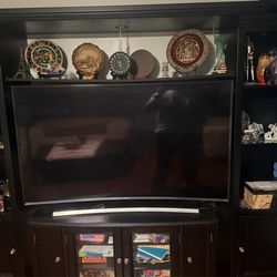 Entertainment center 4 piece includes Samsung curved tv 65”