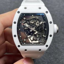 Unisex Swiss watch 31.25*29.45mm hollow dial ceramic case rubber strap