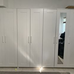 IKEA closets.   A Total Of three.  2with 2 doors each and 1 with 2 doors and mirror  