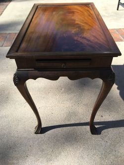 WOODEN SIDE TABLE WITH END LEAFS