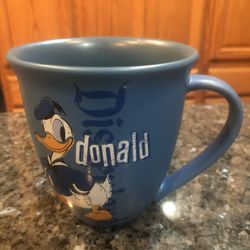 Disney Donald Duck Coffee Cup Mug.  The cup says “Disneyland Donald”.  Size  4 1/2 inches tall.  Nice weight.  Brand New Never Used.  Purchased at Dis
