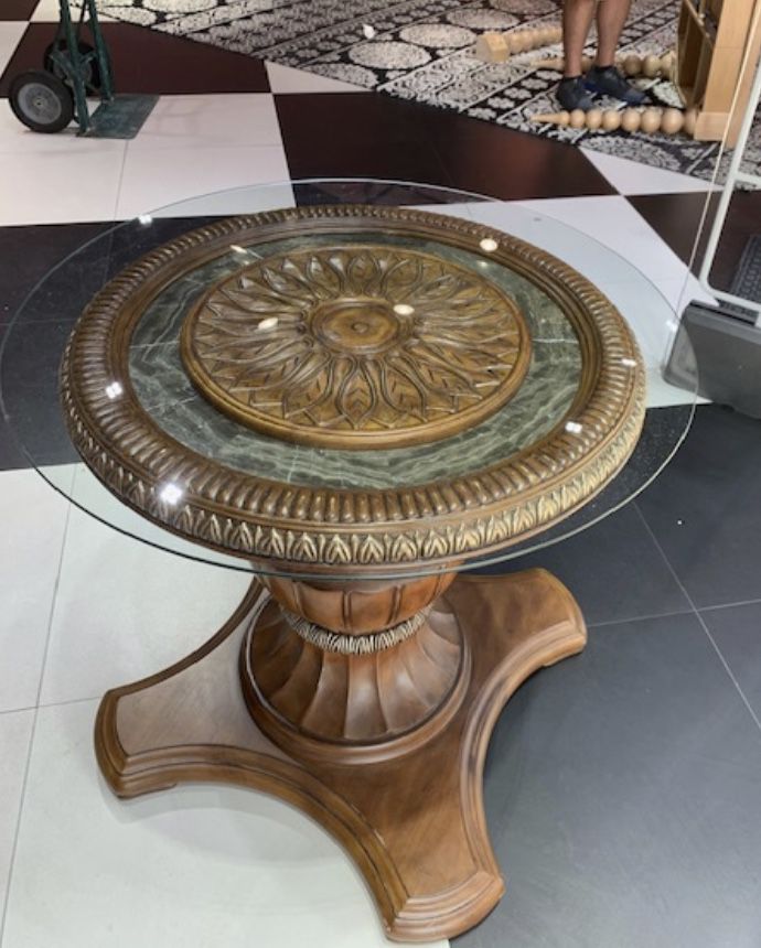 Antique table with glass top