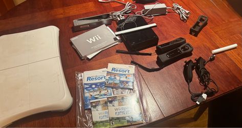 Nintendo Wii Bundle – Black Console, Balance Board, 2 MotionPlus Remotes, 3 Games