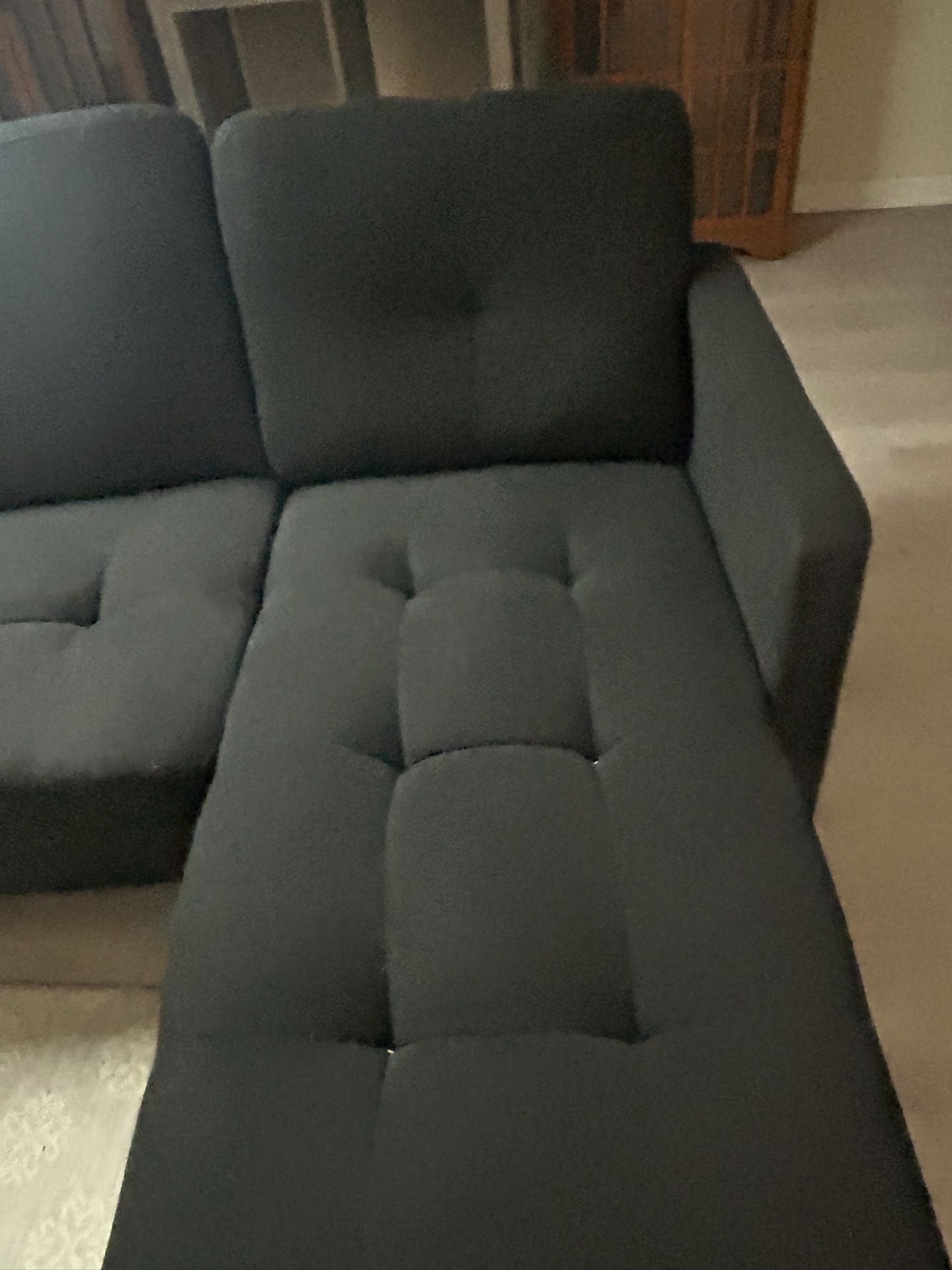 small black sectional couch