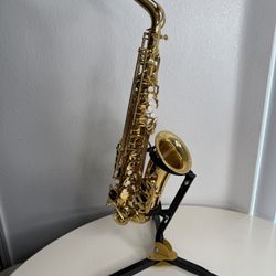 Barely Used Saxophone With Stand