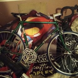 Nice Green Track 🚲 And Electric ⚡ Bike Next To It.