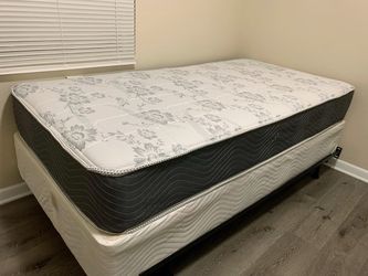 New twin mattress and box spring 2 pc  bed frame is not included