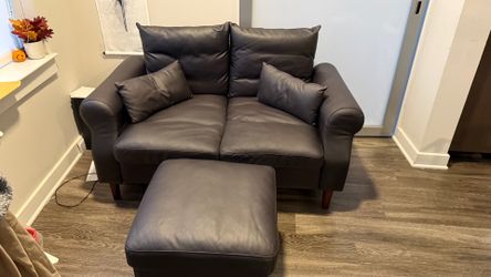 Black faux leather loveseat