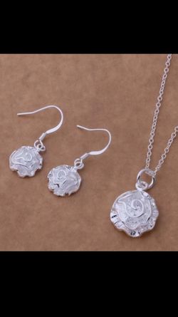 Get a sterling silver necklace and earring set for your mom today