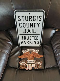 Sturgis signs, used. $40 for both