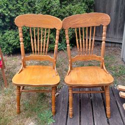 2 solid wood dining chairs