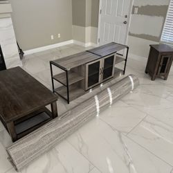 Entertainment Center, Side Table, Coffee Table, And Rug