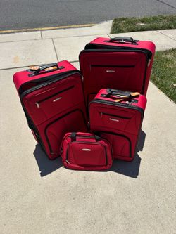 Red Rockland 4 piece luggage set